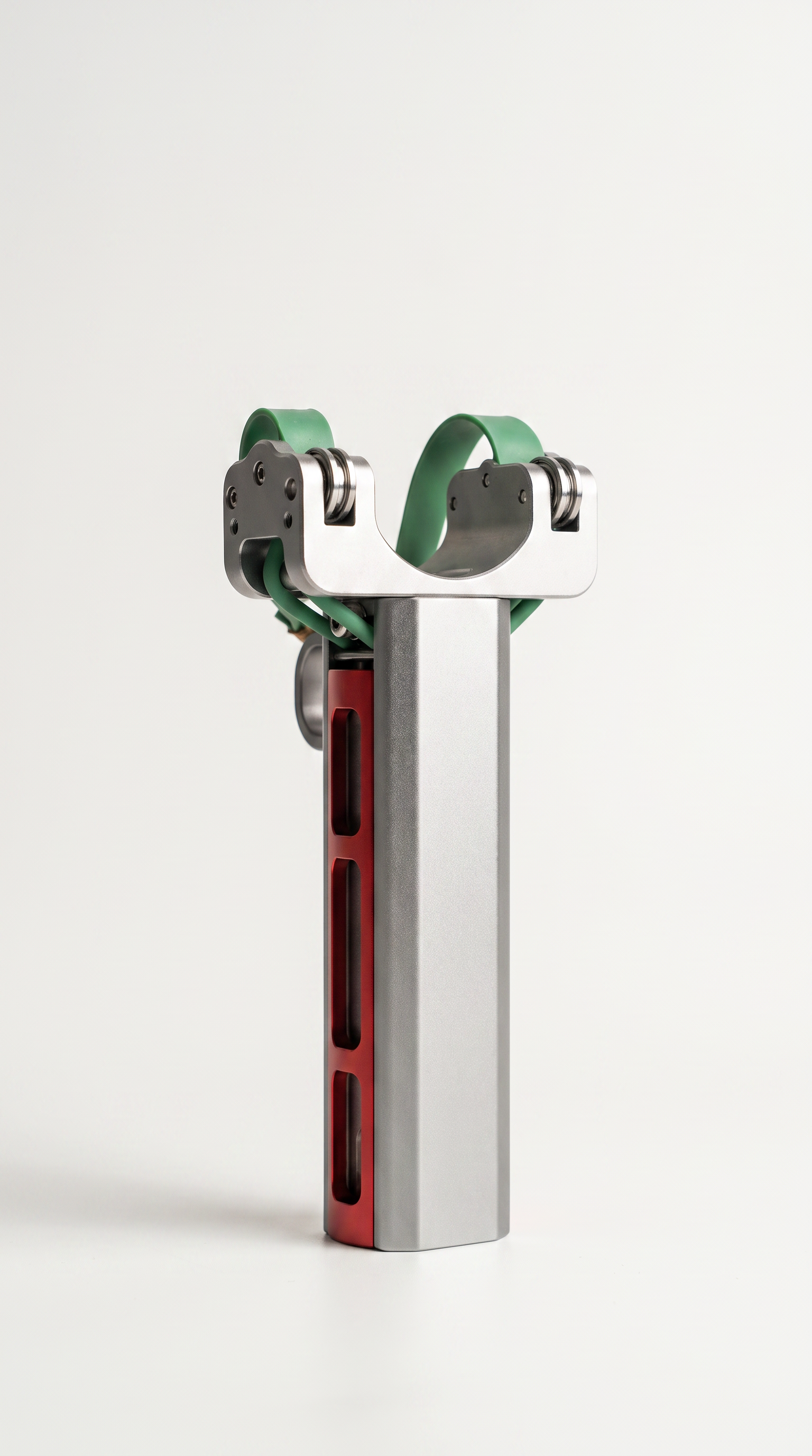 VANTA V10 standing upright, front view of the stainless roller fork head with drilled side plates, roller bearings and green flat bands above the silver body and red magazine channel