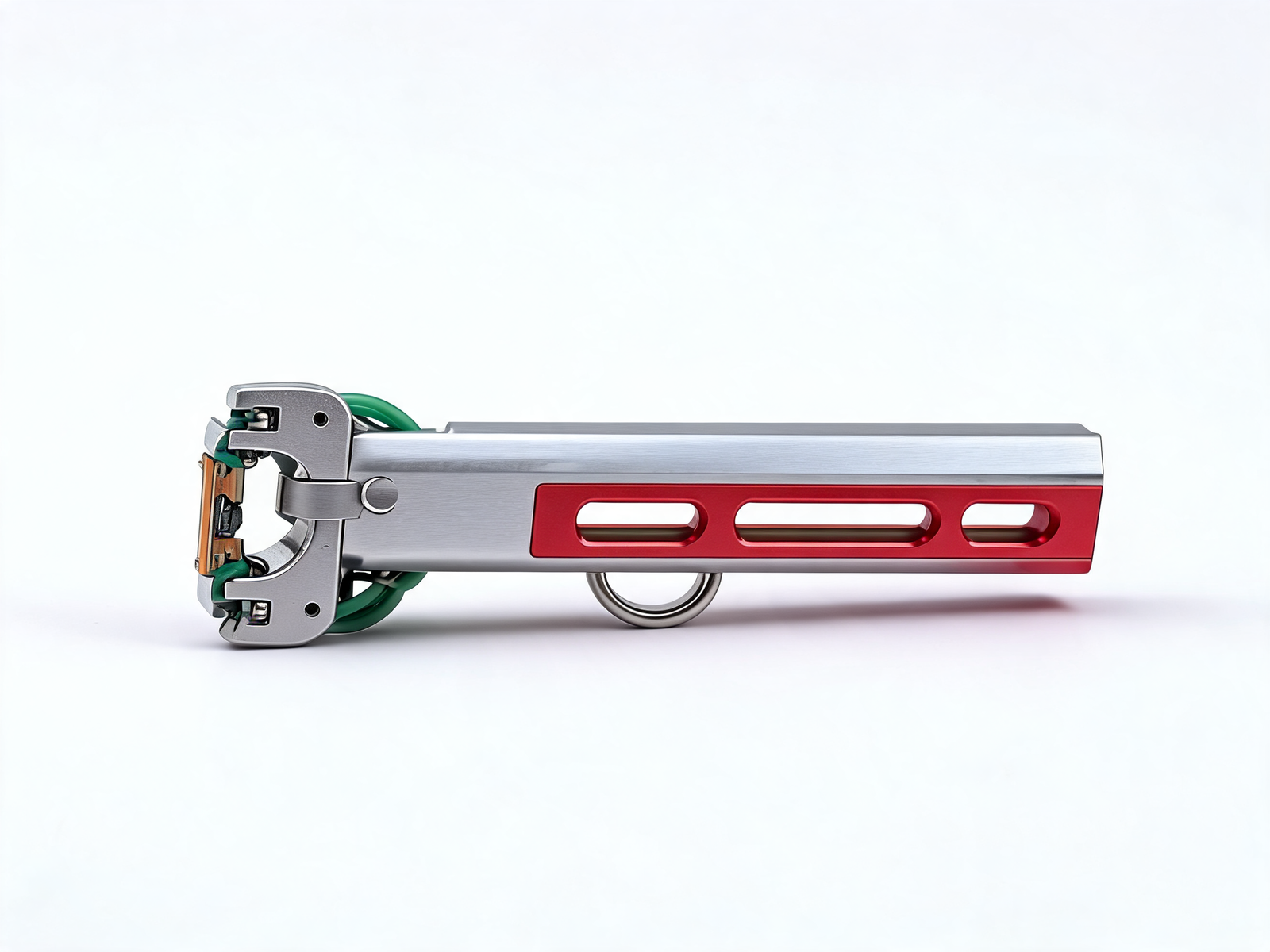 VANTA V10 side profile: full length of the brushed silver aluminium body, red slotted magazine channel, stainless thumb loop and folding roller fork with green flat bands